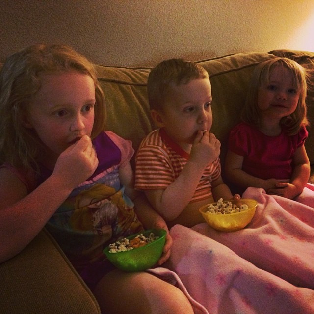 We're watching Tinker bell for movie night. Don't be jealous. G got to pick the treat. Popcorn, goldfish, and M&Ms mixed together.